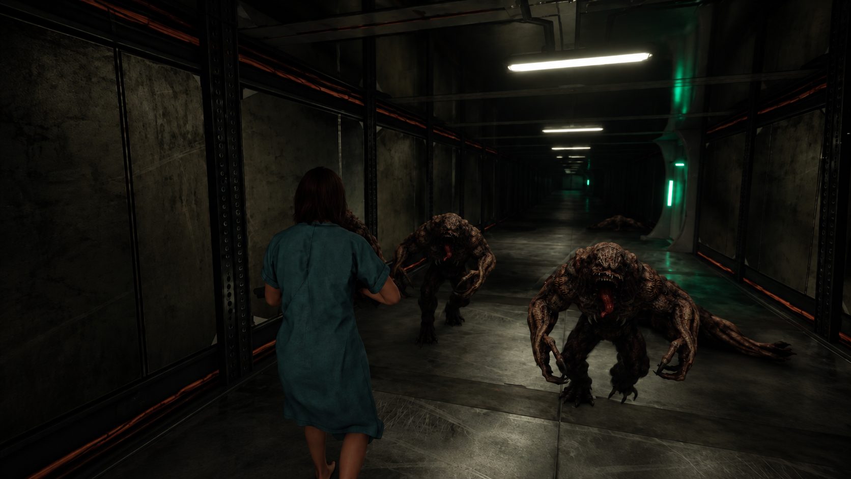 In engine: a patient in a hospital gown running down a corridor while two clawed creatures charge toward her under green emergency lighting.
